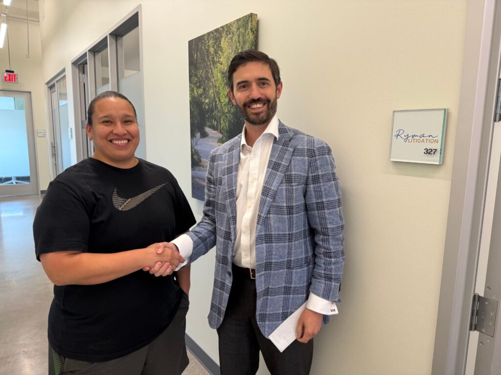 Kyle Ryman with a happy client